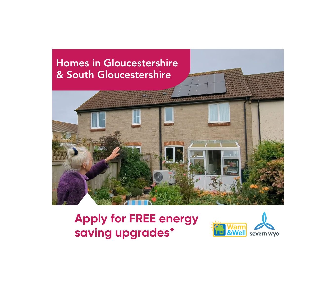 Woman gestures towards a house with solar panels and a heat pump unit